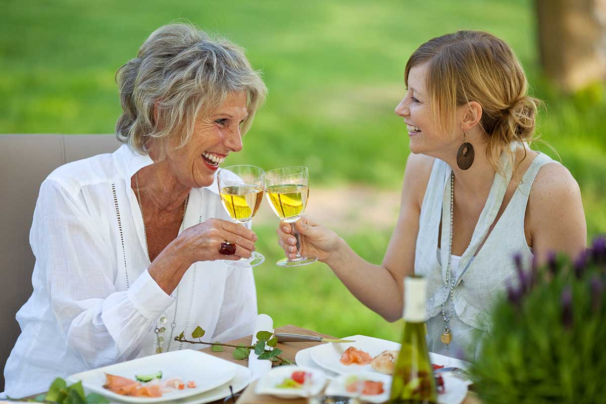 root canal patients enjoying wine after procedure